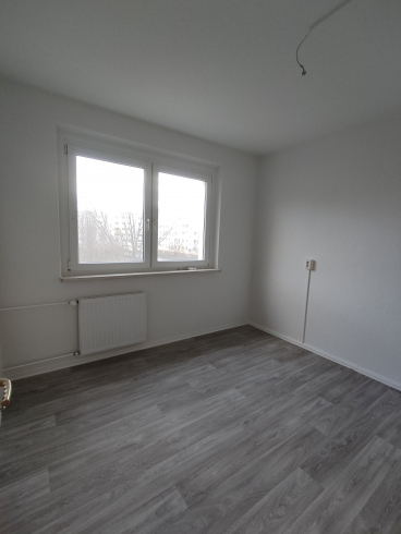 "Wohnen für die Familie: Großzügige 4-Zimmer-Wohnung mit Balkon"